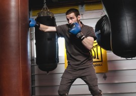 Sweater, $165, and pants, $245, by Sons of Odin; sneakers by Prada, $770, available at Harry Rosen.