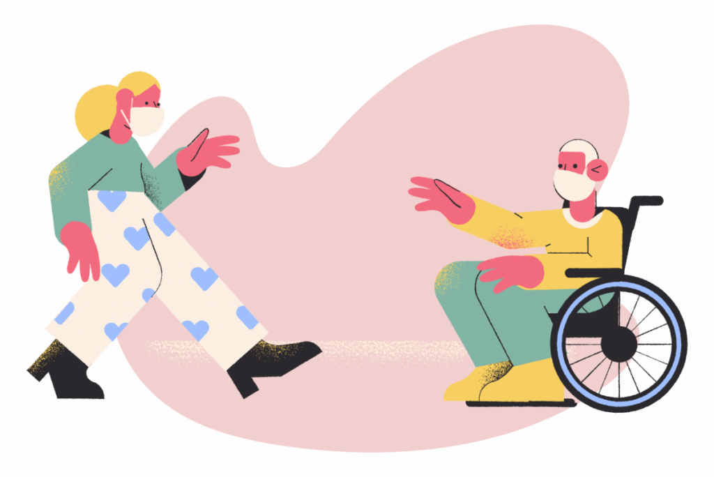 two people wearing masks. One in a wheelchair.