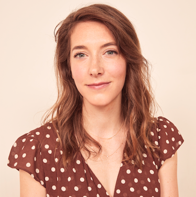 Woman in polka dot blouse