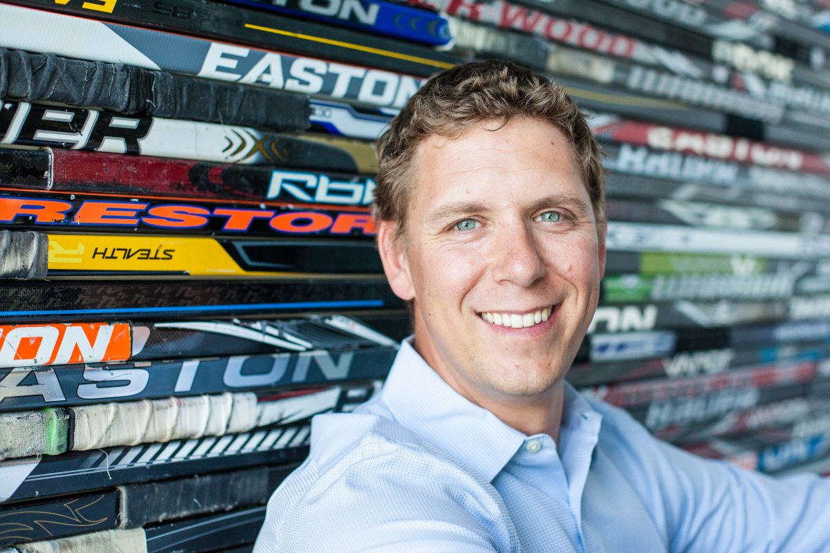 A man stares smiles at the camera. His name is Greg Malpass, founder of Traction on Demand.