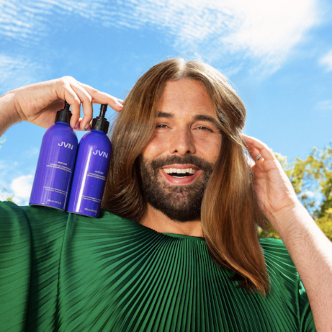 Jonathan Van Ness (JVN) poses with a product from JVN Hair.