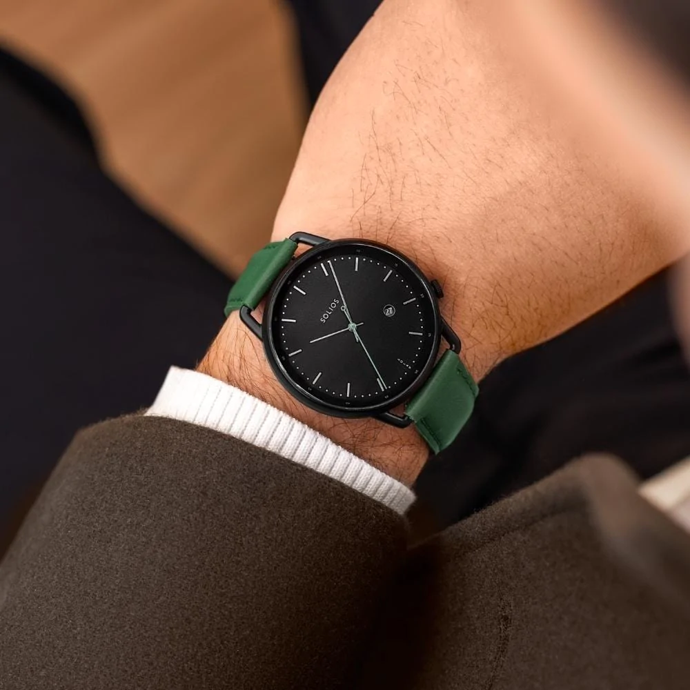 Solios brand's Solar Curve timepiece on a man's wrist.