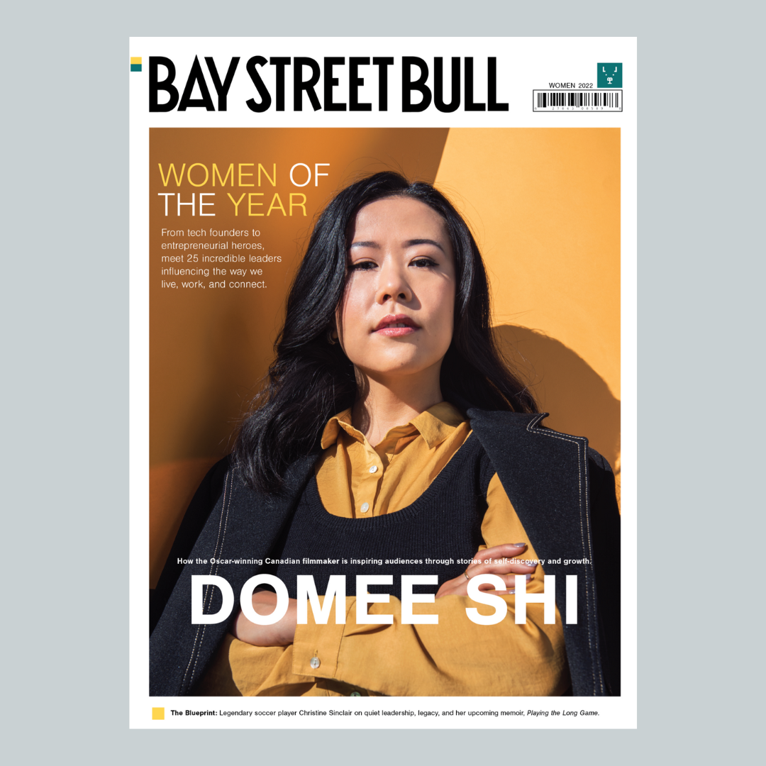Cover of Bay Street Bull magazine with Domee Shi wearing yellow shirt against yellow backdrop