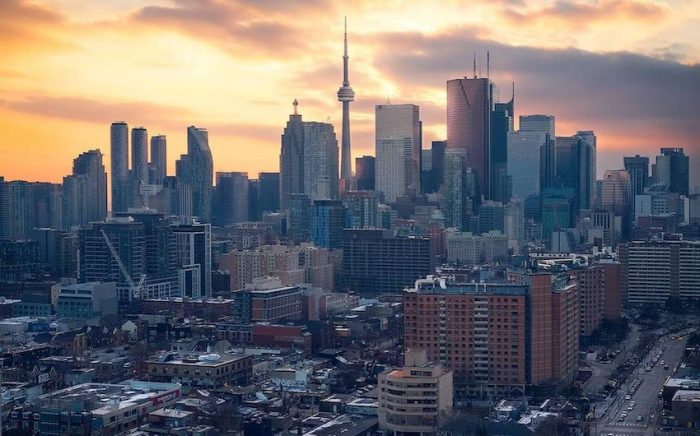 Toronto's skyline shows the CN tower in the distance.